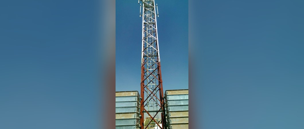 RDU lattice tower standing on steel ballast blocks, Sudan