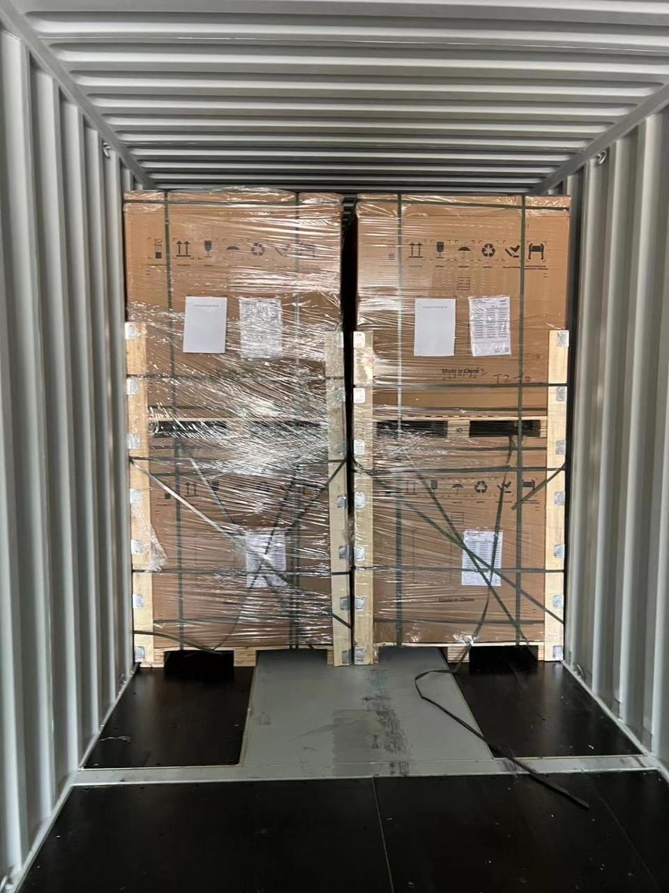 Container loaded with crated equipment