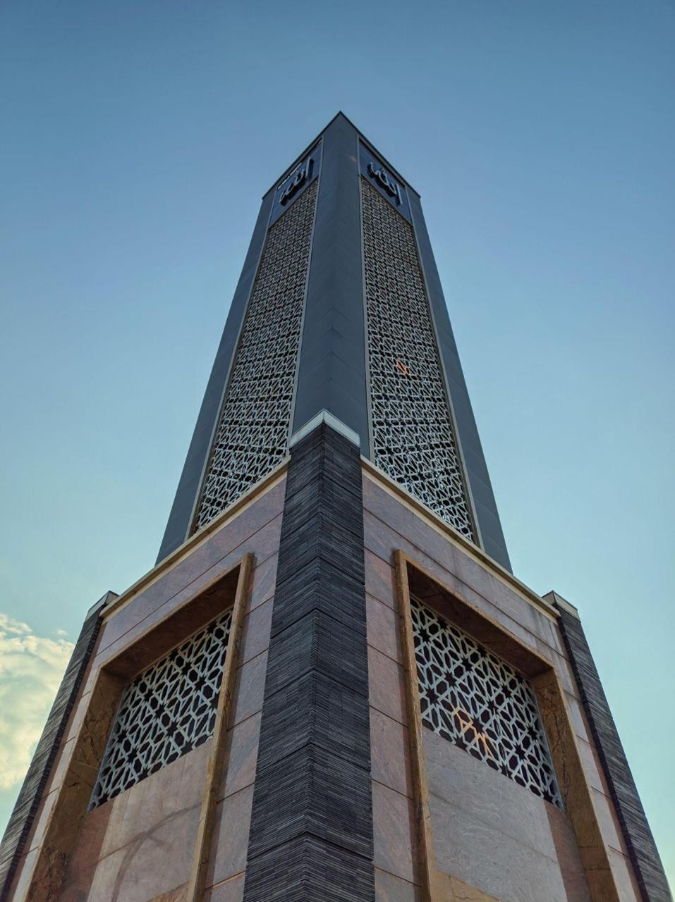 Custom minaret-style camouflage tower with lattice panels